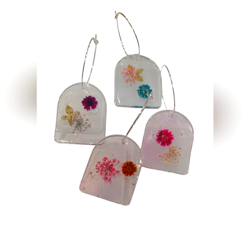 Handmade (by me), unique, resin drop earrings made with real dried flowers